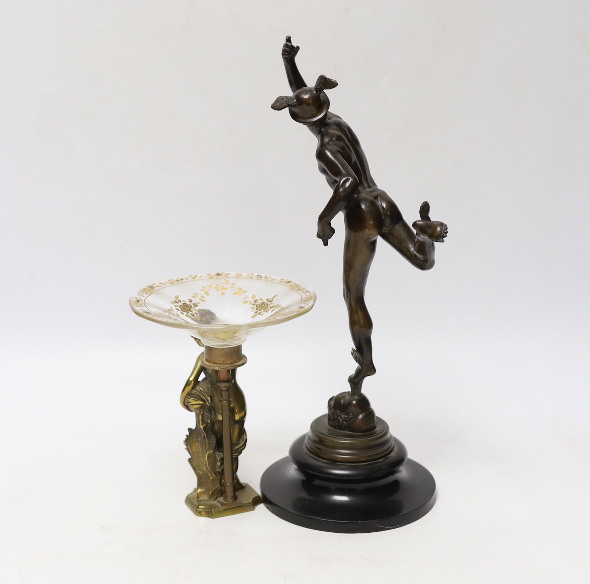 A small bronze model of Hermes, after the Antique, together with a small tazza with cast brass female nude, bronze 27cm (2)